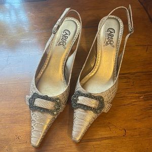 Carlos Santana buckle kitten heals